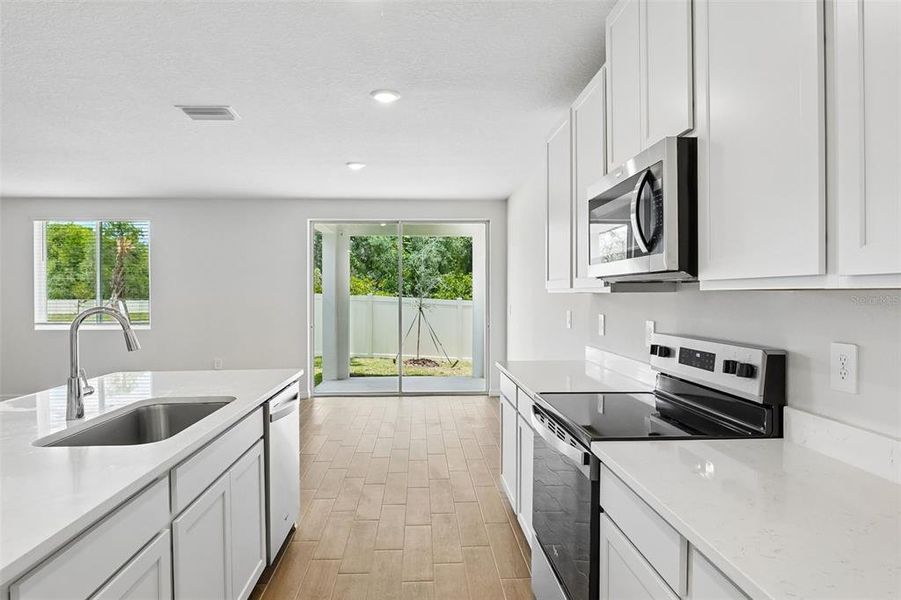 Furnished interior view inside a new home in Pine Ridge Meadows, Hudson (Image 14).