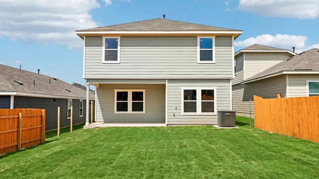 Exterior details and patio area of a home in Prairie Lakes, Buda (Image 4).