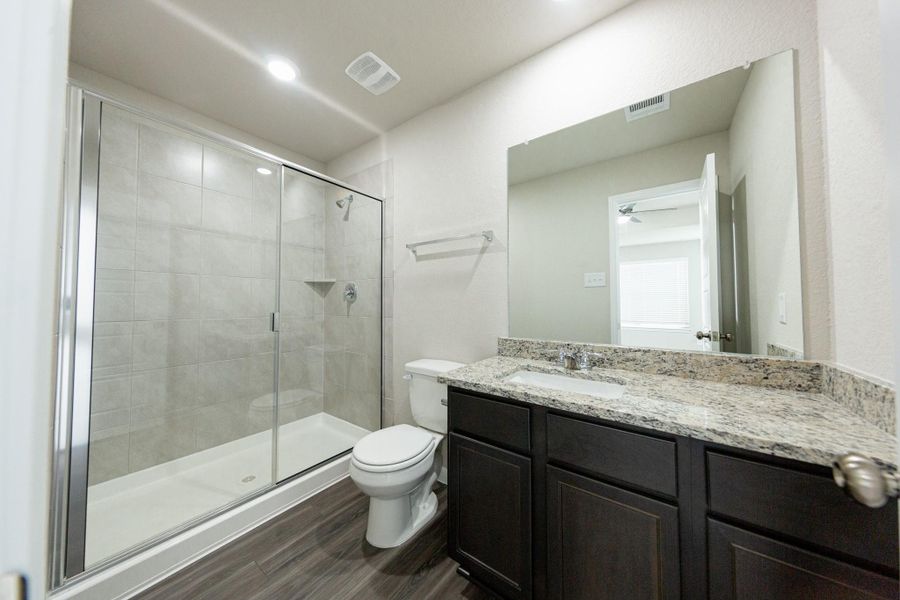 Furnished interior view inside a new home in Mackenzie Creek, Conroe (Image 6).