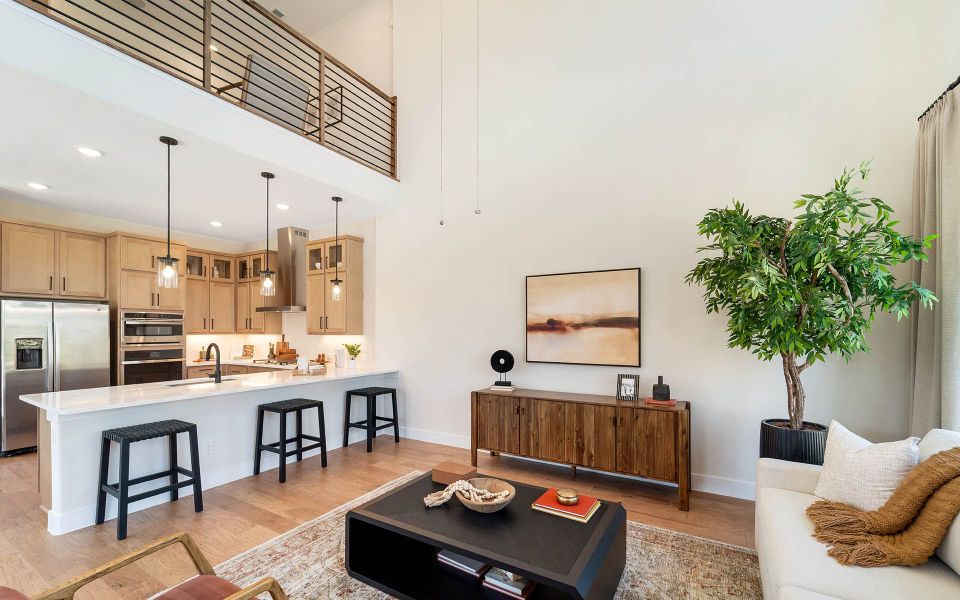 Representative furnished interior of a home built from the Rainier by CastleRock Communities in The Summit at Center Stage, Keller (Image 7).
