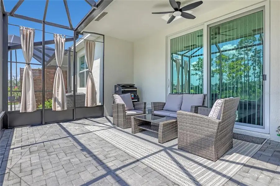 Exterior details and patio area of a home in The Timbers at Everlands, Palm Bay (Image 3).