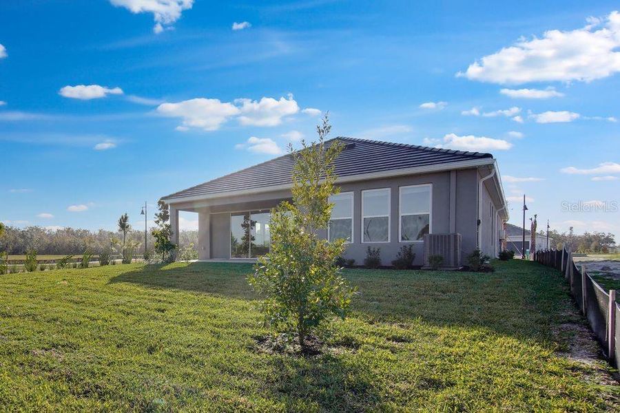 Exterior details and patio area of a home in Hammock at Two Rivers, Zephyrhills (Image 3).