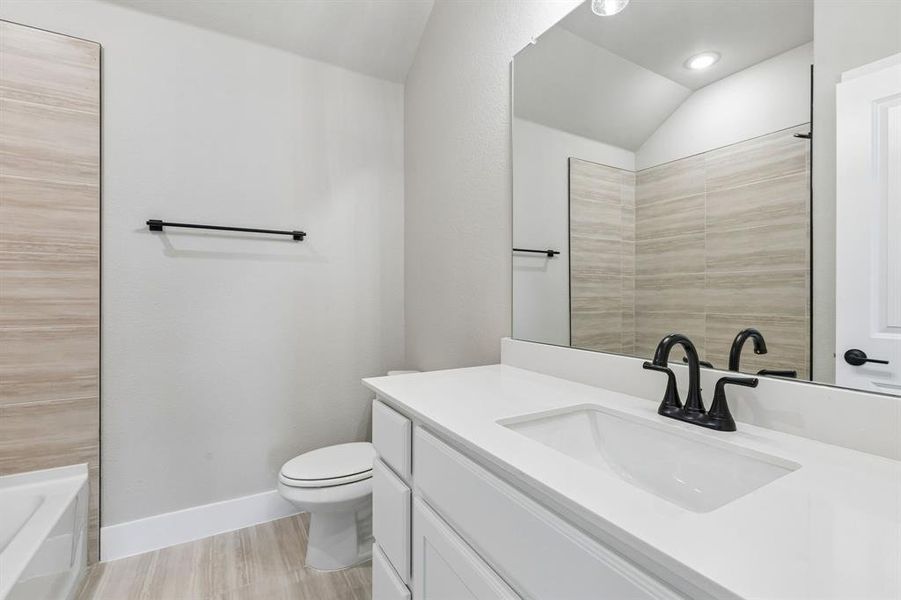Furnished interior view inside a new home in Painted Tree Woodland West, McKinney (Image 13).