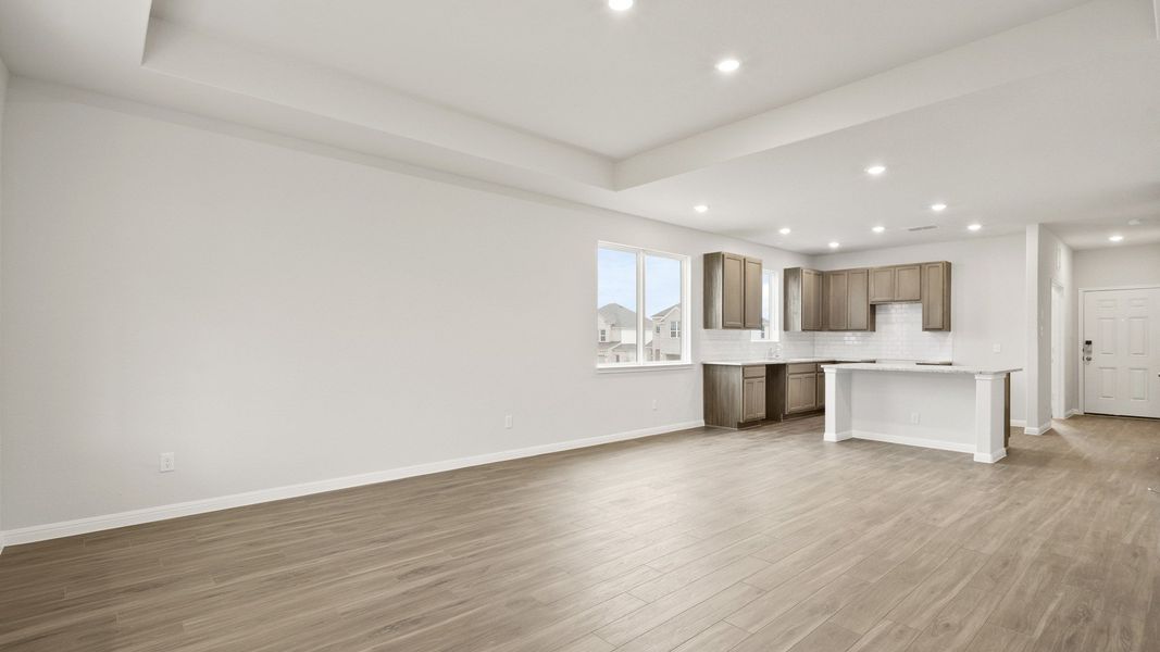 Spacious, unfurnished interior of a new home in Hunters Ranch, San Antonio (Image 12).