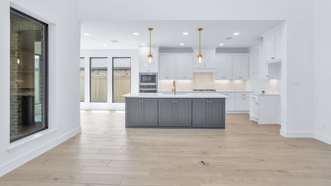 Furnished interior view inside a new home in Bridgeland, Cypress (Image 6).