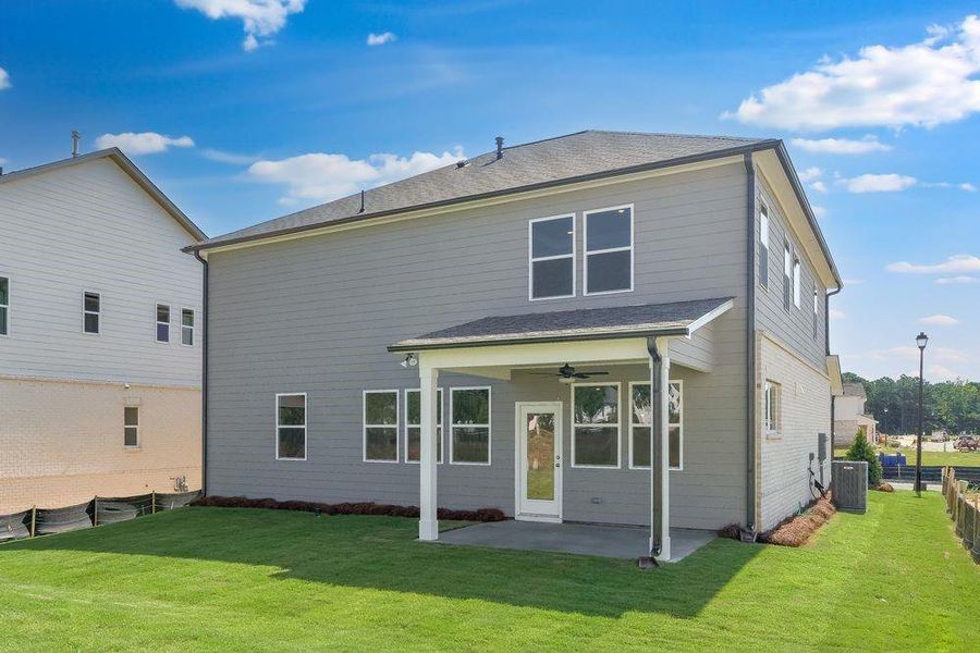 Front exterior of a new home in Oakmead, Buford, GA, highlighting curb appeal (Image 21). Front exterior of a new home in Oakmead, Buford, GA, highlighting curb appeal (Image 21).