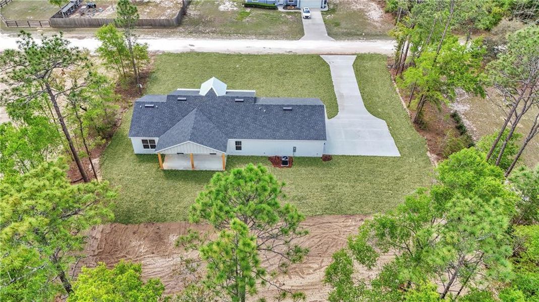 Front exterior of a new home in , Ocala, FL, highlighting curb appeal (Image 27).