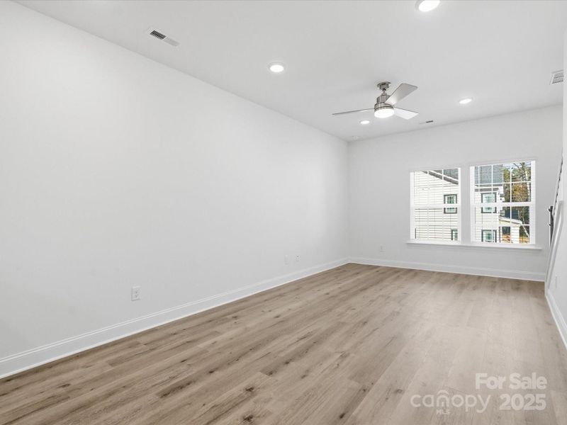 Spacious, unfurnished interior of a new home in Sycamore Trail, Matthews (Image 29).