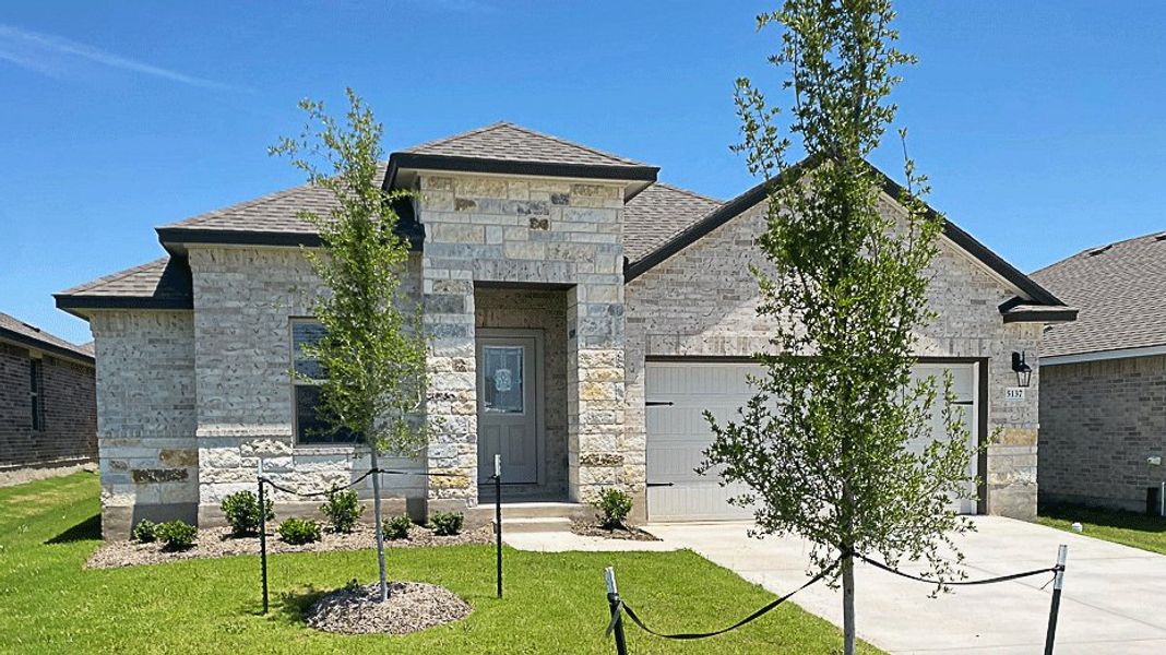 Front exterior of a new home in Three Creeks - Colt Creek, Belton, TX, highlighting curb appeal (Image 19).