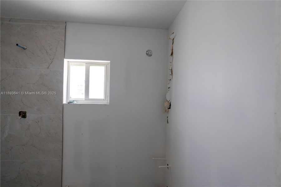 In-progress construction of a new home in , Miami, FL (Image 11).