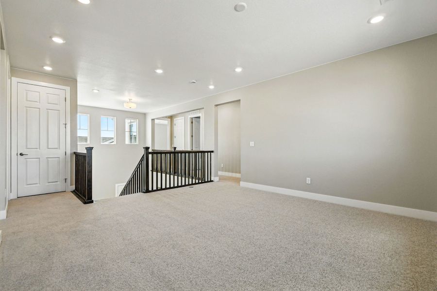 Spacious, unfurnished interior of a new home in Trailstone, Arvada (Image 31).