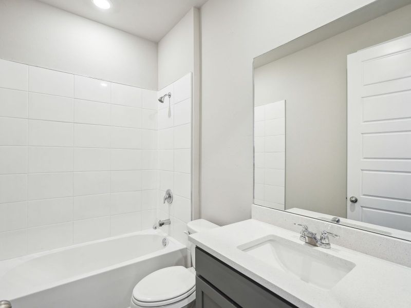 Furnished interior view inside a new home in Crescent Lakes - Reserve Series, Punta Gorda (Image 10).