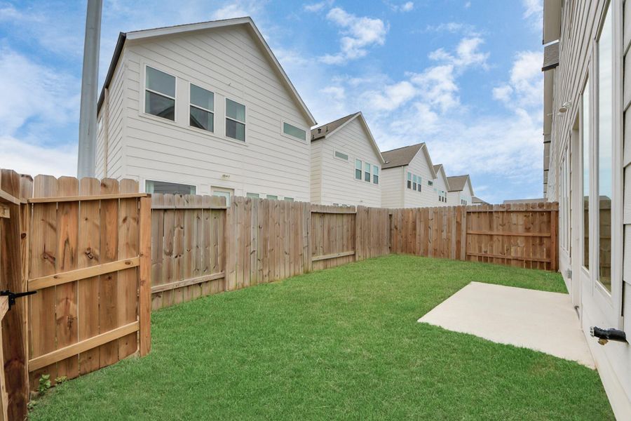 Front exterior of a new home in Agua, Houston, TX, highlighting curb appeal (Image 3).