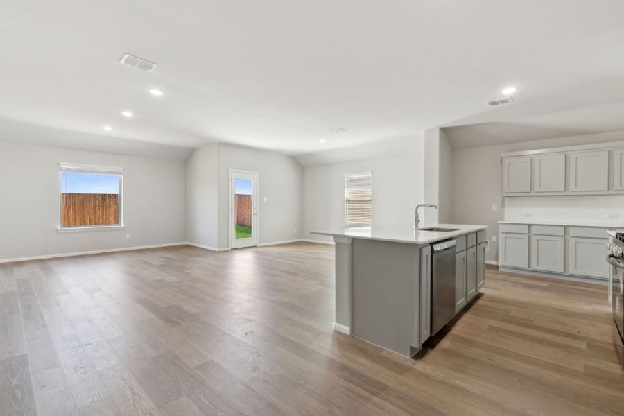 Open Floor Plan in the Harrison home plan by Trophy Signature Homes – REPRESENTATIVE PHOTO Open Floor Plan in the Harrison home plan by Trophy Signature Homes – REPRESENTATIVE PHOTO