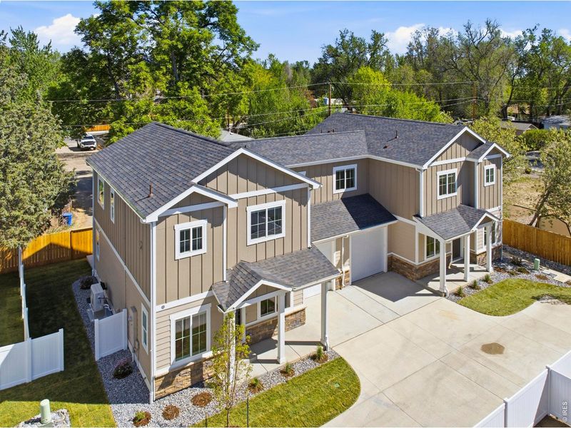 Front exterior of a new home in , Loveland, CO, highlighting curb appeal (Image 26).
