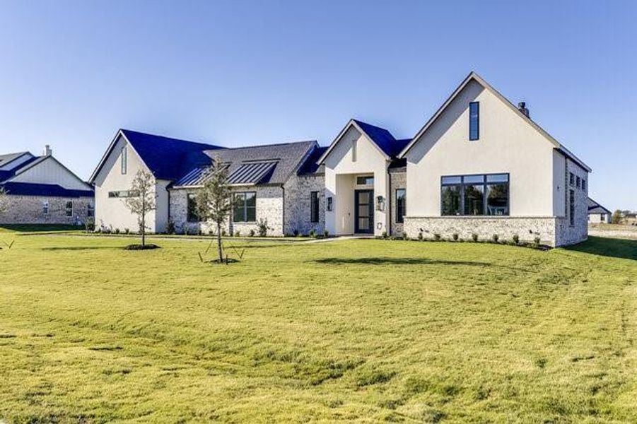 Front exterior of a new home in , Midlothian, TX, highlighting curb appeal (Image 2). Front exterior of a new home in , Midlothian, TX, highlighting curb appeal (Image 2).