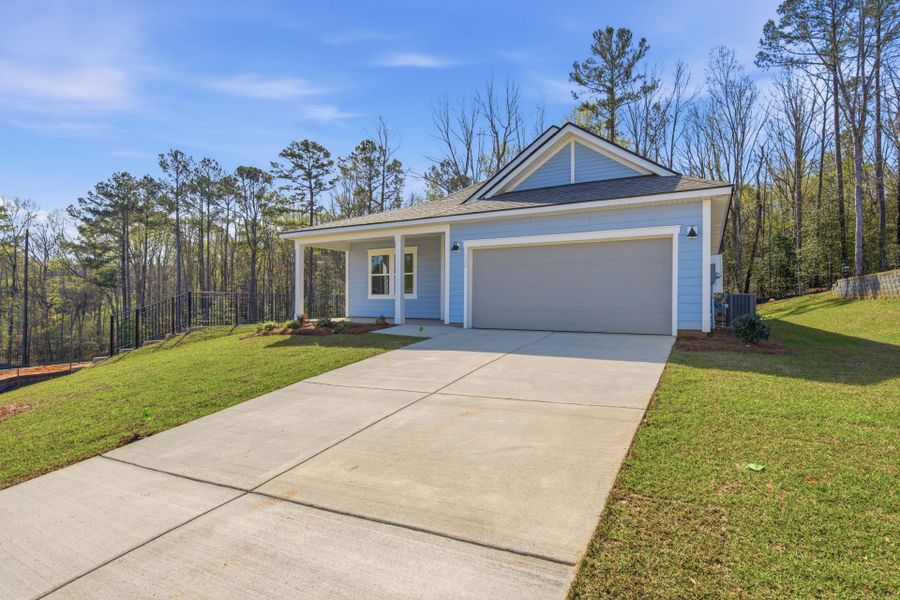 Front exterior of a new home in Carriage Estates, Lexington, SC, highlighting curb appeal (Image 21).