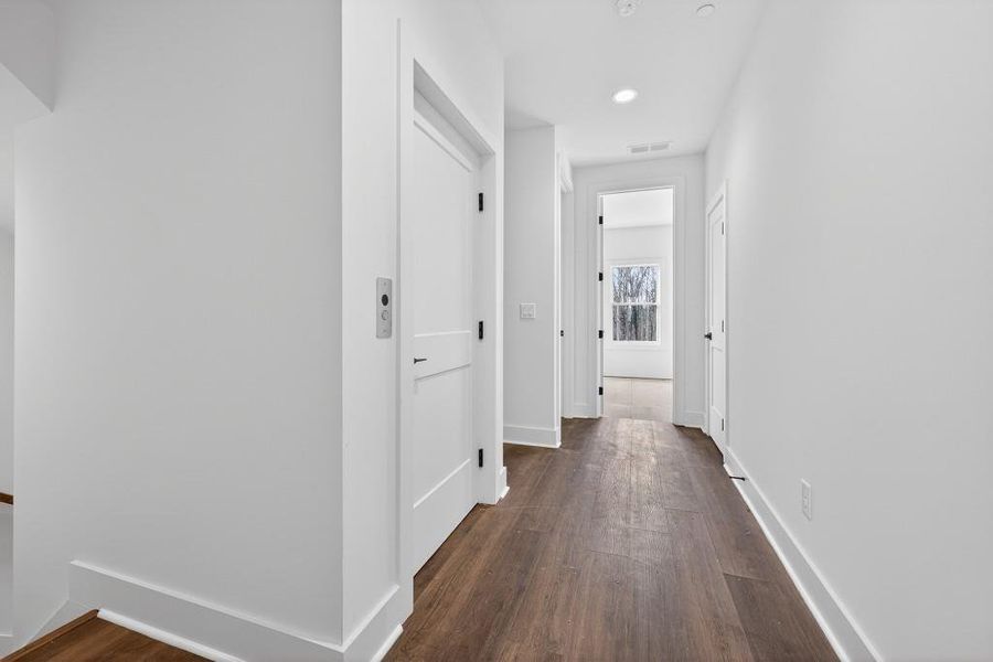 Spacious, unfurnished interior of a new home in Skyview On Broad, Sugar Hill (Image 25). Spacious, unfurnished interior of a new home in Skyview On Broad, Sugar Hill (Image 25).