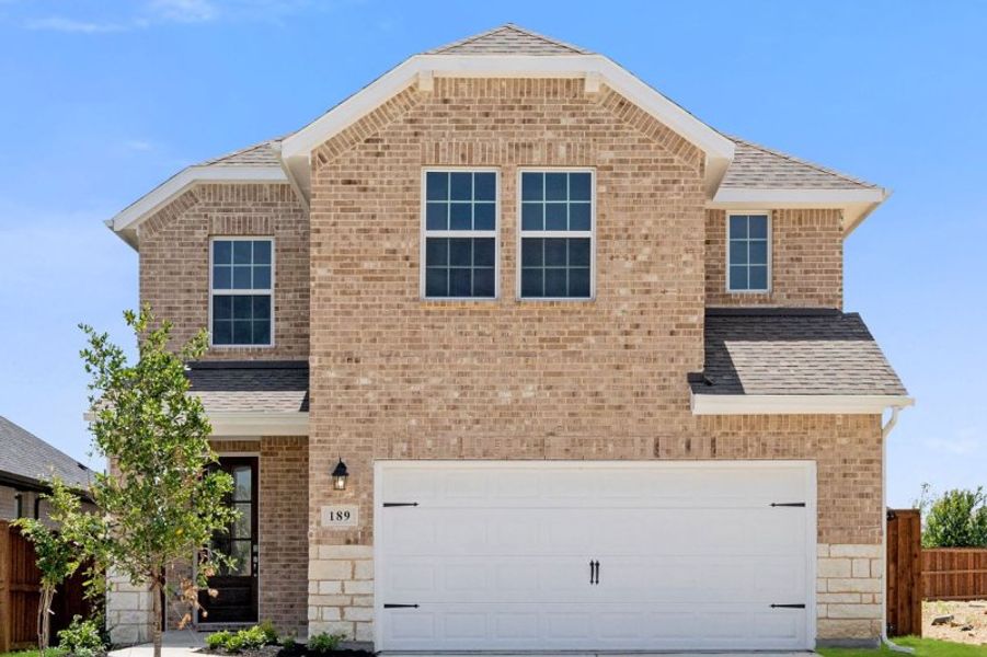 Representative exterior photo of a completed home built from the Walton by UnionMain Homes in Elevon, Lavon, TX (Image 25).