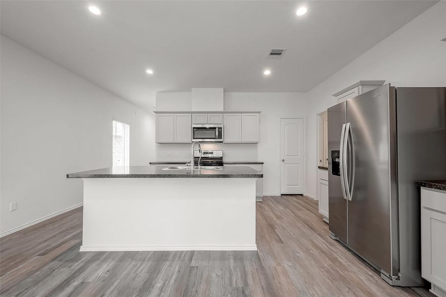 Furnished interior view inside a new home in Breckenridge Forest, Spring (Image 11).