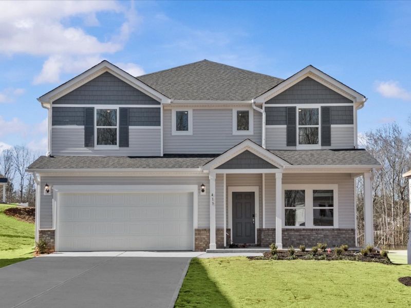 Front exterior of a new home in Maxwell Commons, Easley, SC, highlighting curb appeal (Image 1). Front exterior of a new home in Maxwell Commons, Easley, SC, highlighting curb appeal (Image 1).