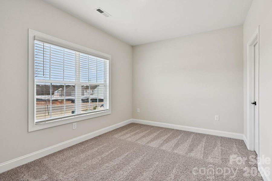 Spacious, unfurnished interior of a new home in Colonial Crossing, Troutman (Image 17).