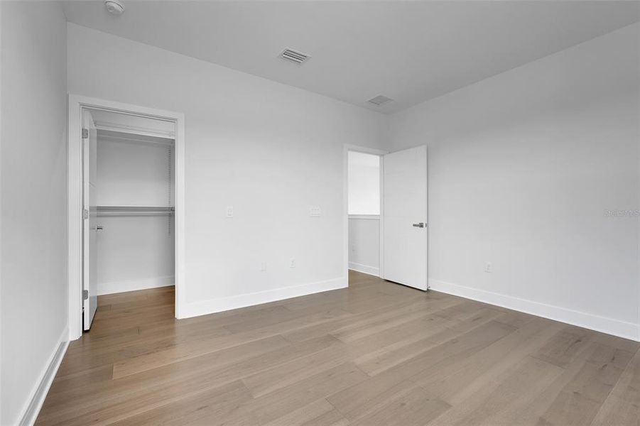 Spacious, unfurnished interior of a new home in Hampton Green at Providence, Davenport (Image 47).