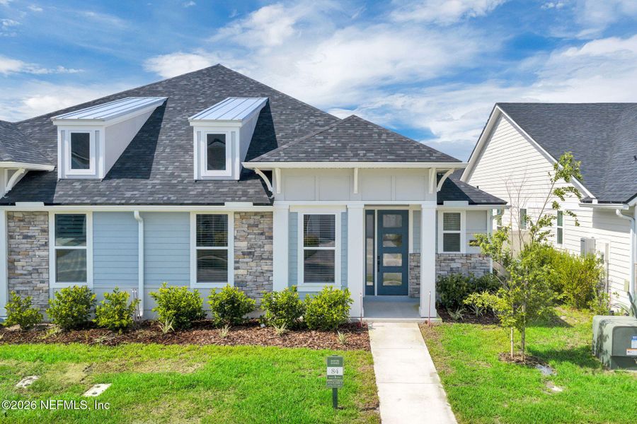 Front exterior of a new home in , Ponte Vedra, FL, highlighting curb appeal (Image 29). Front exterior of a new home in , Ponte Vedra, FL, highlighting curb appeal (Image 29).