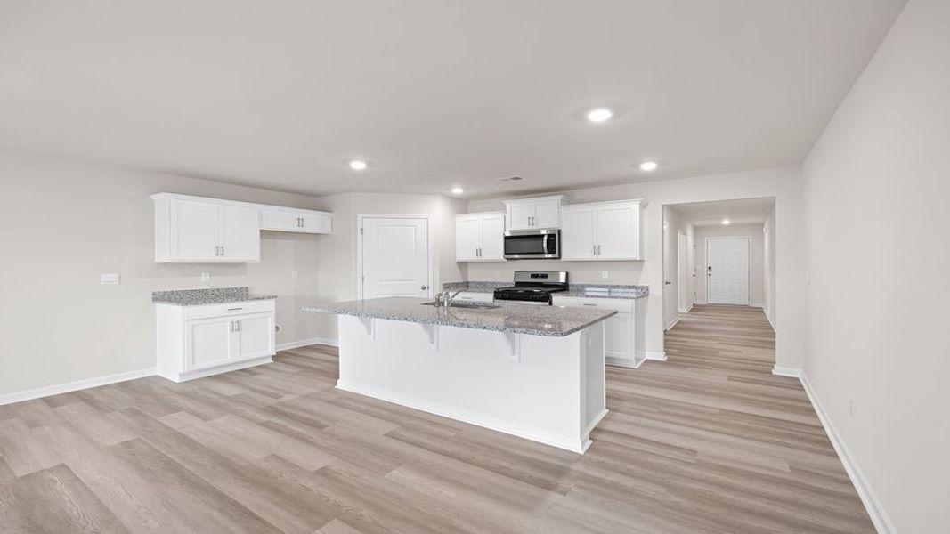 Furnished interior view inside a new home in Lakestone, Woodruff (Image 8).