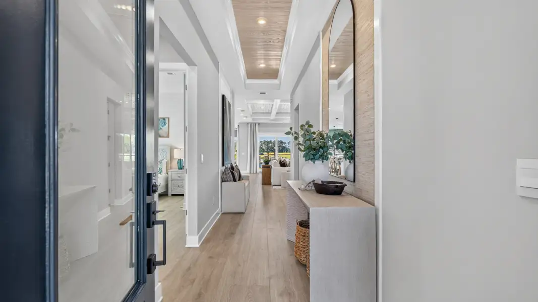 Representative furnished interior of a home built from the Frasier by D.R. Horton in Broward Key, Jacksonville (Image 5).