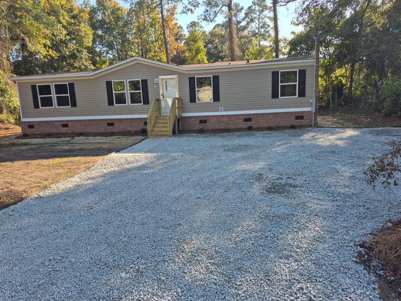 Exterior details and patio area of a home in , Walterboro (Image 13).