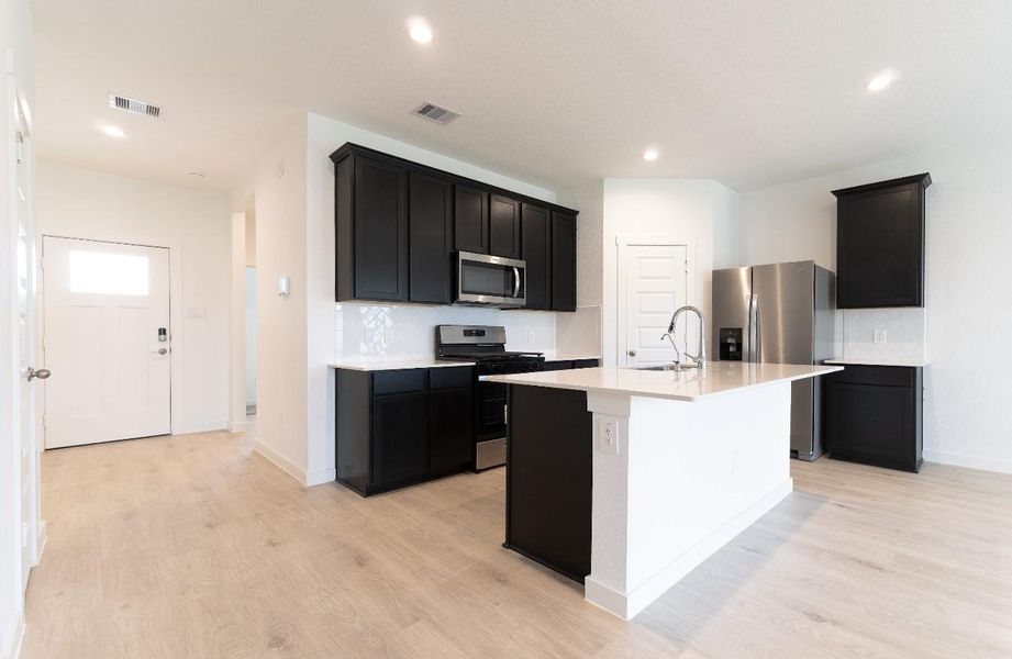 Furnished interior view inside a new home in Tamarron, Katy (Image 7).