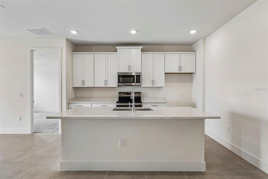 Furnished interior view inside a new home in Lakeside at Satilla, St. Cloud (Image 9).