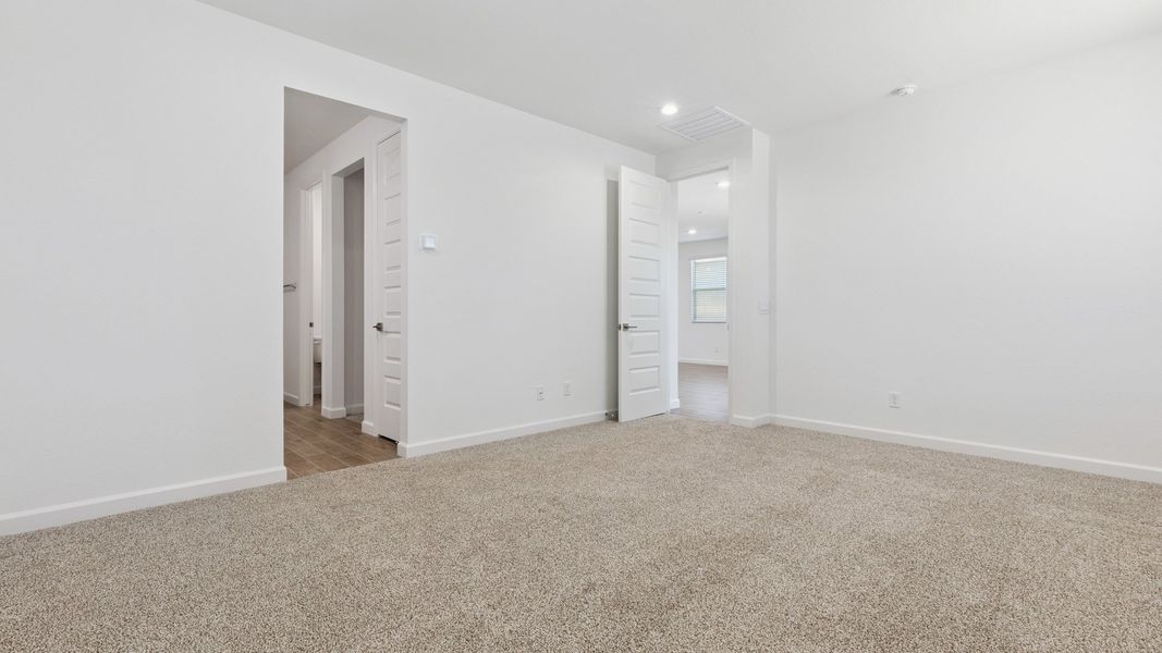 Spacious, unfurnished interior of a new home in Zanjero Pass, Waddell (Image 22).