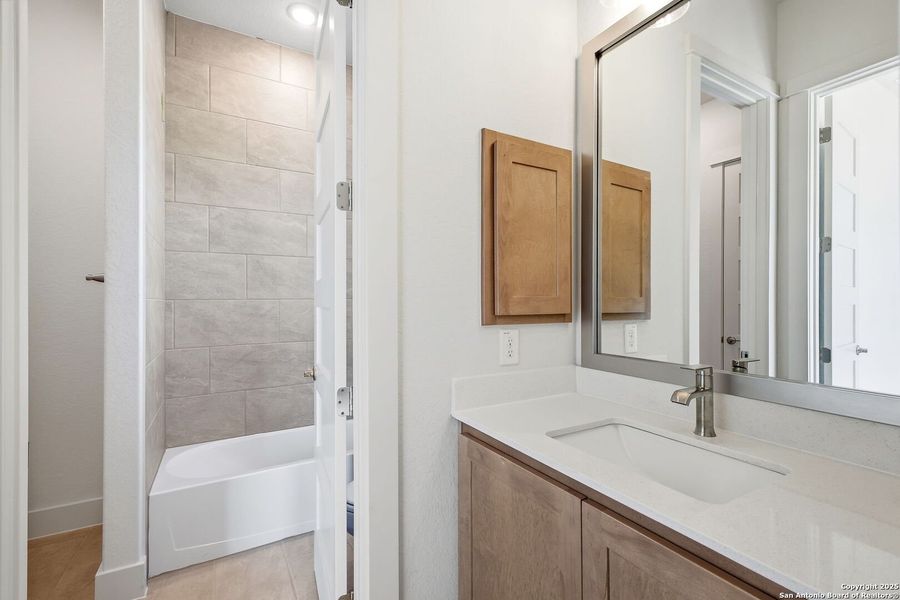 Furnished interior view inside a new home in Pradera Ridge, Floresville (Image 7).