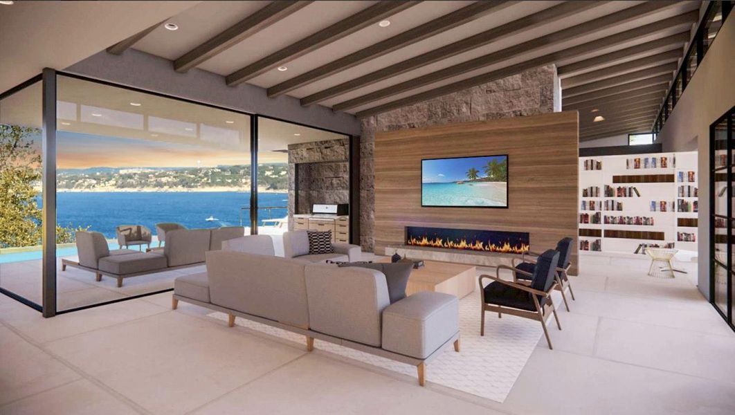 Living area with a lit fireplace, beam ceiling, a water view, and recessed lighting
