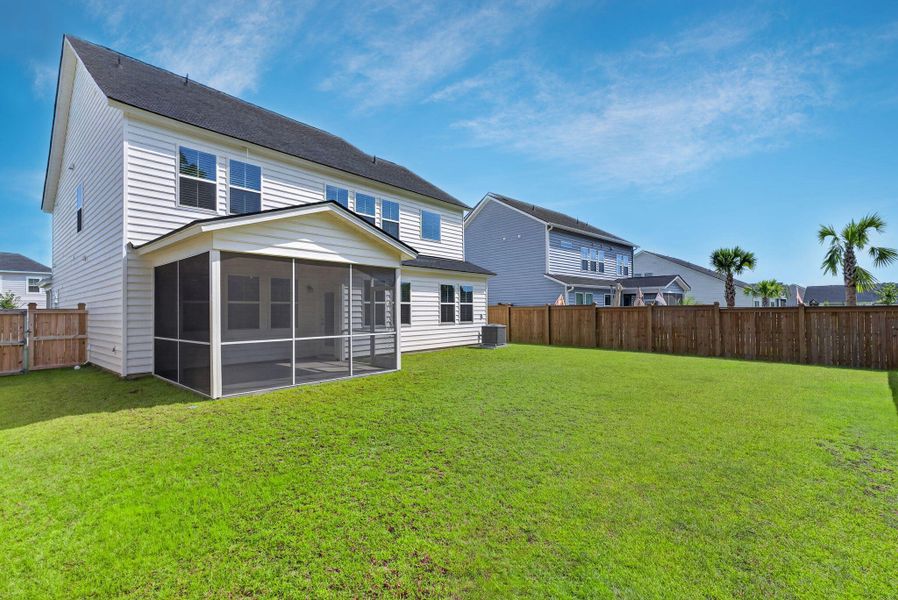 Exterior details and patio area of a home in Sweetgrass at Summers Corner, Summerville (Image 34).