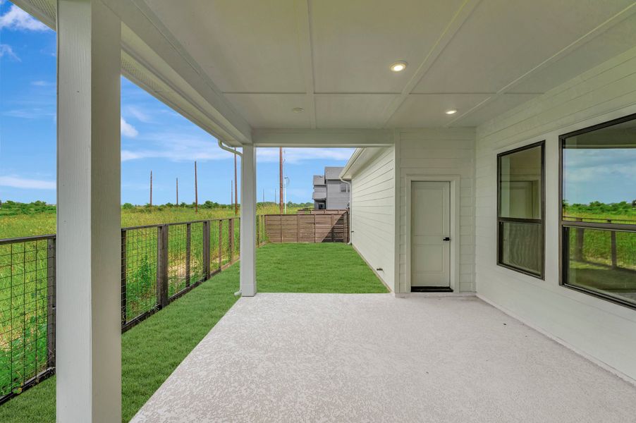 Exterior details and patio area of a home in Indigo - Enclave Collection, Richmond (Image 3). Exterior details and patio area of a home in Indigo - Enclave Collection, Richmond (Image 3).