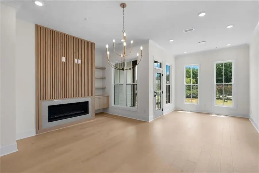 THE DETAILS DO NOT LEAVE ANY ROOM UNFINISHED!  TEXTURE, WOOD TONES, TALL WINDOWS ALL COMBINED PROVIDE A PERFECT CANVAS FOR YOU TO COMPLETE WITH YOUR DECOR.