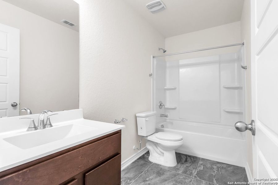Furnished interior view inside a new home in Spanish Trails Villas, San Antonio (Image 4).