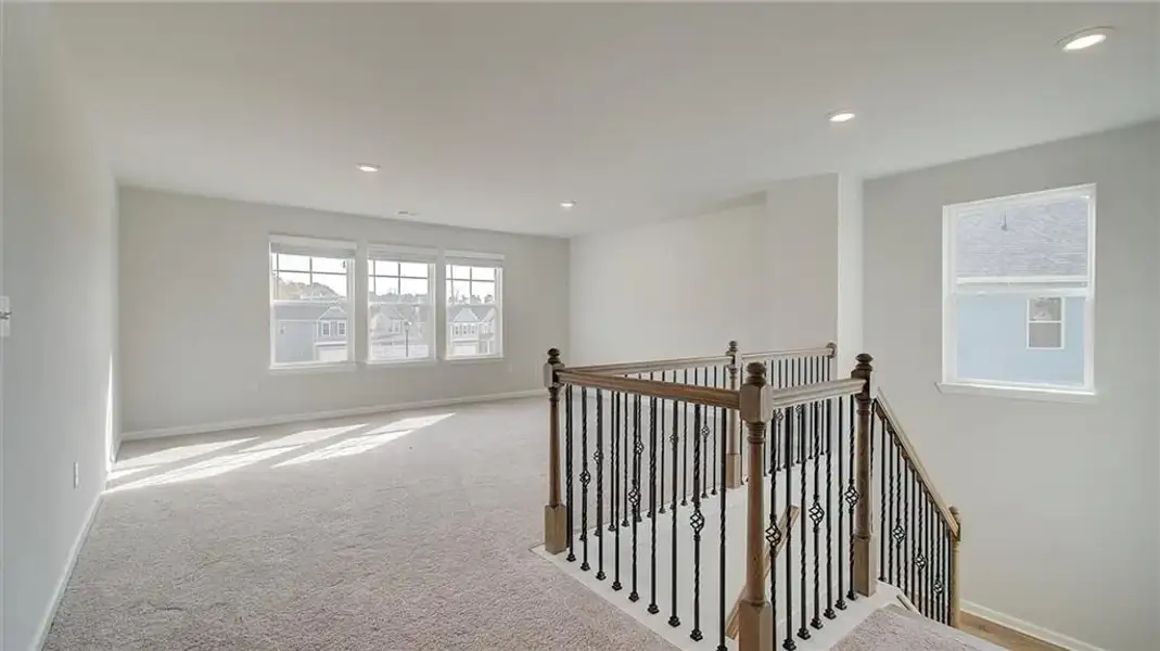 Spacious, unfurnished interior of a new home in Brighton, Locust Grove (Image 24).