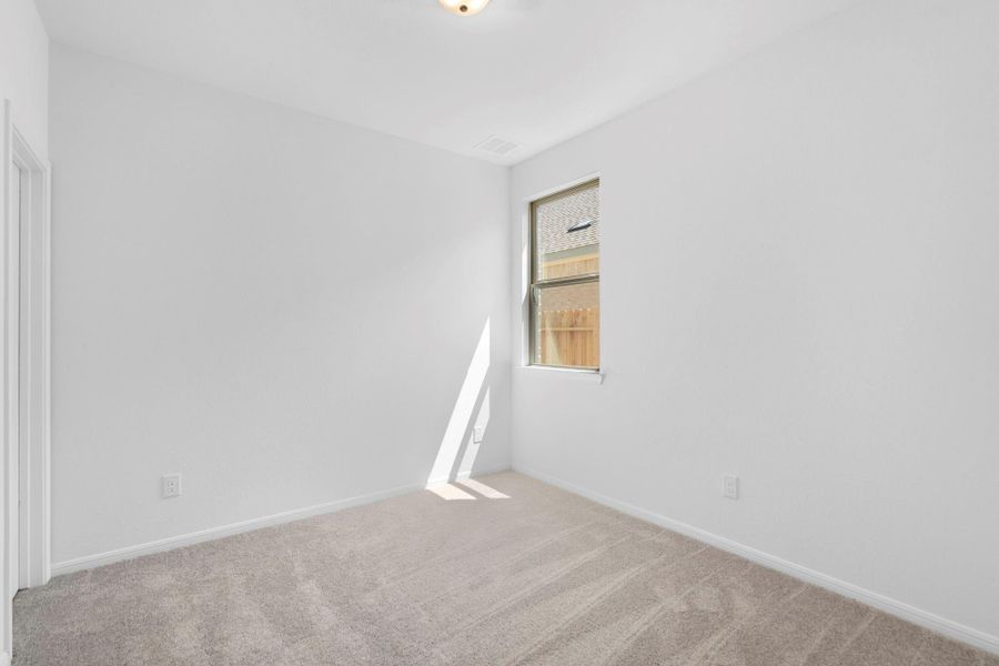 Your secondary bedroom features plush carpet, fresh paint, closet, and a large window that lets in plenty of natural lighting. Your secondary bedroom features plush carpet, fresh paint, closet, and a large window that lets in plenty of natural lighting.