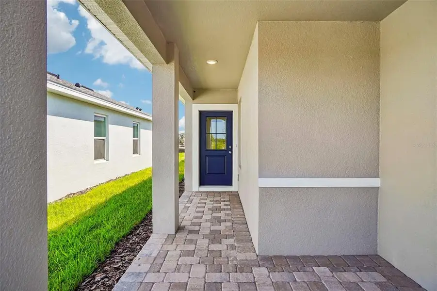 Exterior details and patio area of a home in Willowbrook North, Winter Haven (Image 4). Exterior details and patio area of a home in Willowbrook North, Winter Haven (Image 4).