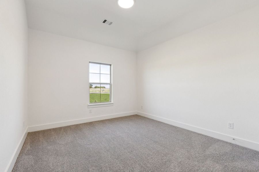 Representative unfurnished interior of a home built from the Halsted by Centre Living Homes in Lakeway Estates, Waxahachie (Image 27).