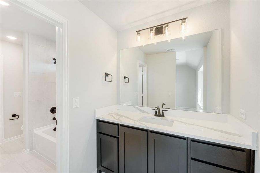 Furnished interior view inside a new home in Eagle Glen 60, Alvarado (Image 11).