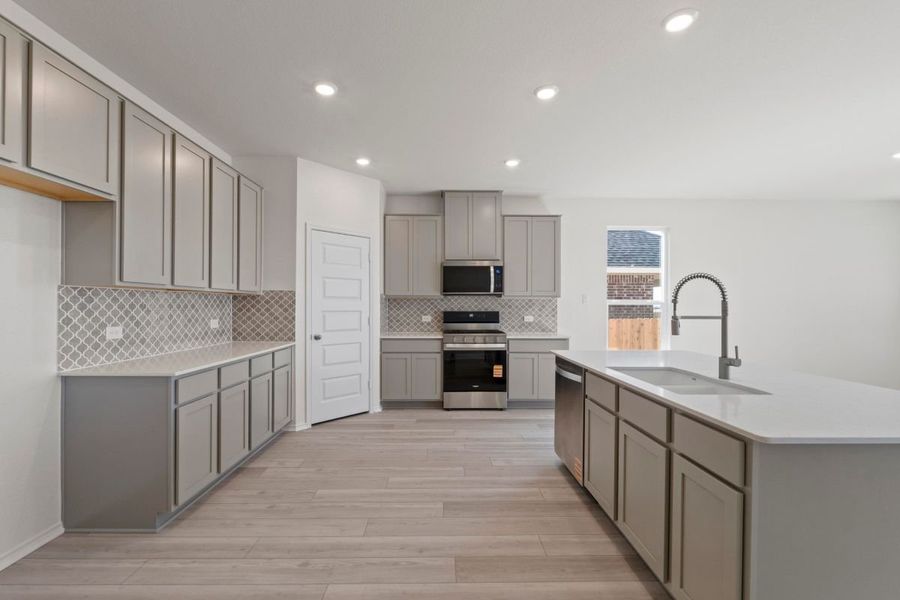 Furnished interior view inside a new home in Salerno - Classic Collection, Round Rock (Image 4). Furnished interior view inside a new home in Salerno - Classic Collection, Round Rock (Image 4).