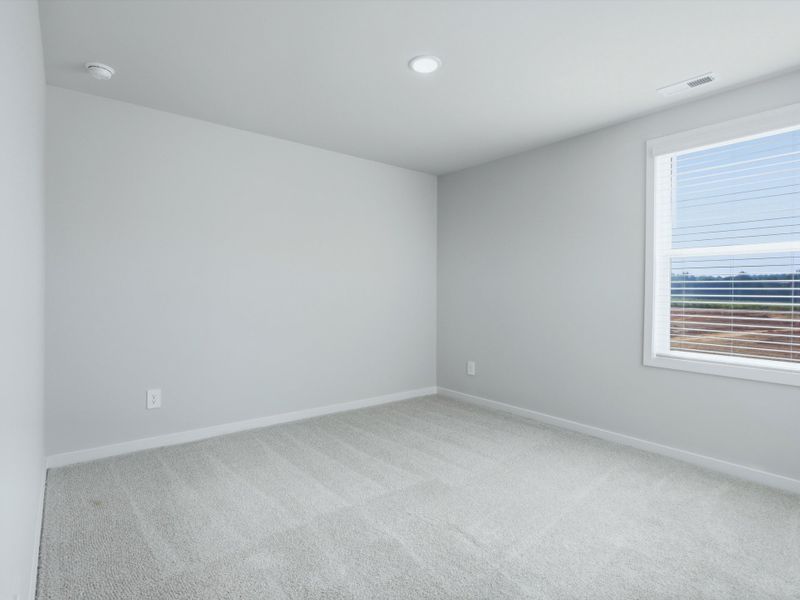 Spacious, unfurnished interior of a new home in Marshburn Landing - Bungalow Series, Wendell (Image 18).