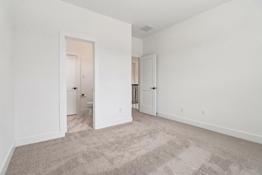 Spacious, unfurnished interior of a new home in The Highlands, Porter (Image 31).