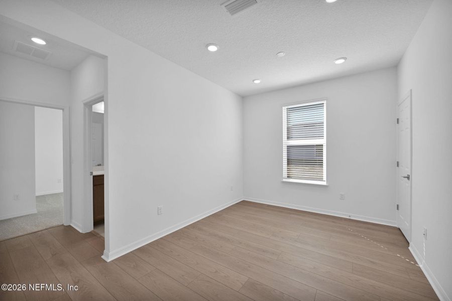 Spacious, unfurnished interior of a new home in Del Webb Wildlight, Yulee (Image 15).