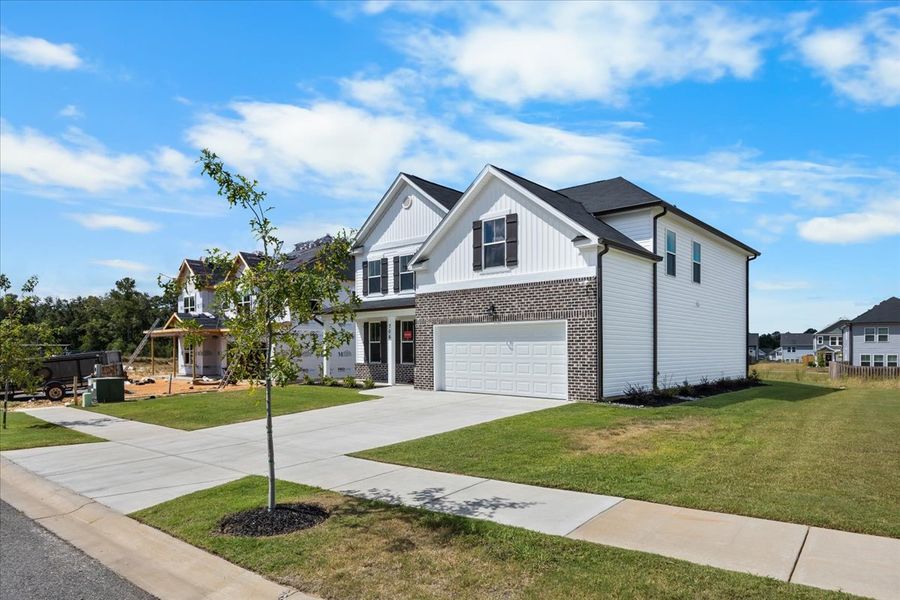 Front exterior of a new home in Windsor, North Augusta, SC, highlighting curb appeal (Image 20).